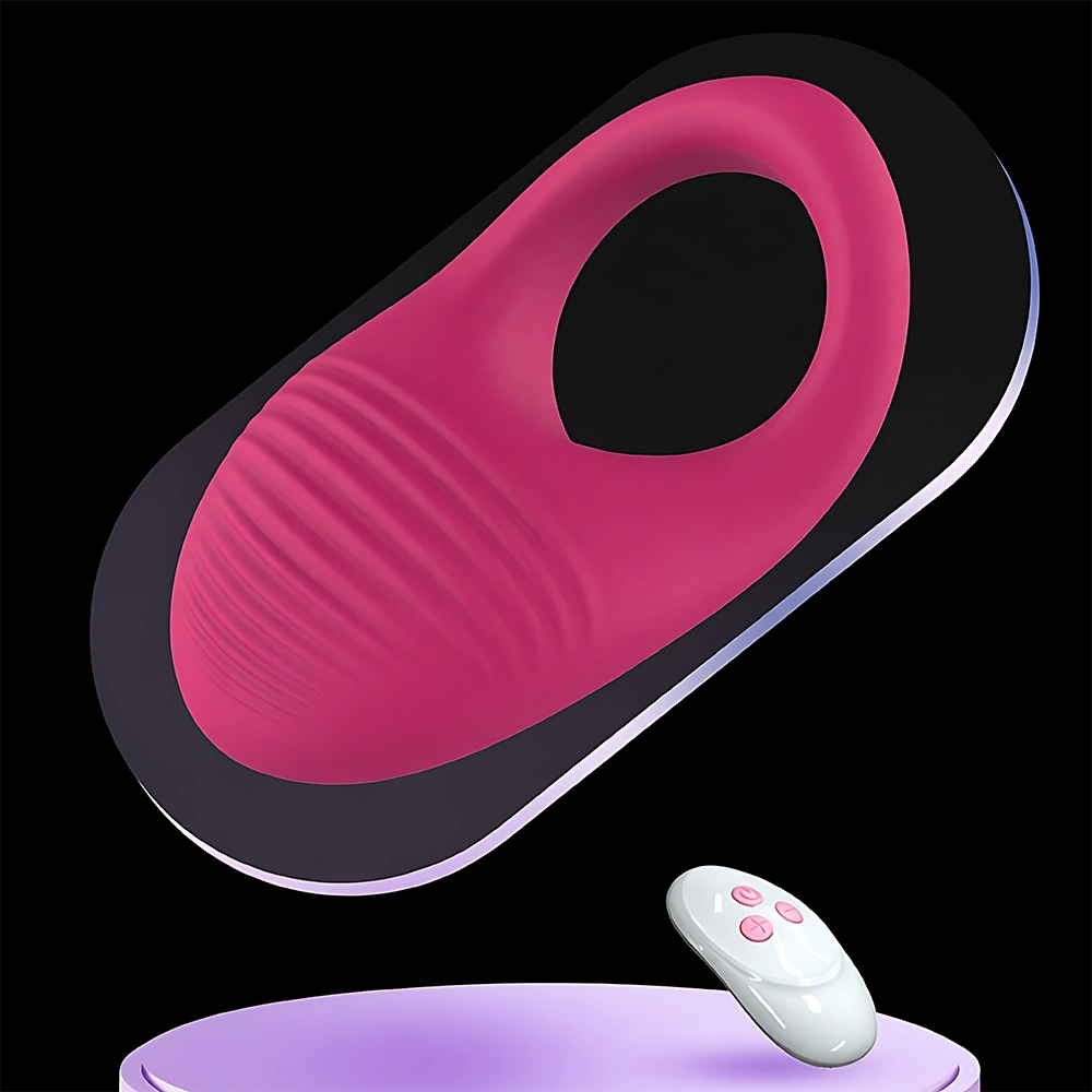 Pink Serica Penis Ring floating above a purple pedestal with a white remote control beside it. Textured exterior for clitoral stimulation, ergonomic inner ring, and built-in vibration motor. Premium body-safe silicone adult toy with remote control for hands-free use. Waterproof and rechargeable for ultimate pleasure.