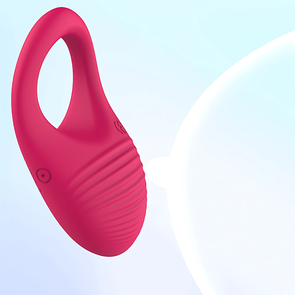 Pink Serica Penis Ring shown near a stylized breast silhouette, illustrating its use as a nipple stimulator for women. Textured exterior and built-in vibration motor visible. Premium body-safe silicone adult toy for enhanced foreplay and mutual arousal.