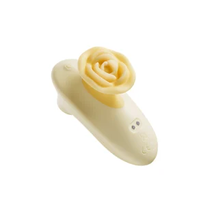 Front-facing view of the Rosé Bloom™ VELLUM clitoral sonic vibrator in soft yellow, featuring a rose-shaped silicone stimulator. The device showcases a smooth, ergonomic body with a power button and charging port, crafted from luxuriously soft, body-safe silicone. Compact, elegant, and designed for intense clitoral pleasure through sonic stimulation. CE-certified and waterproof for safe, travel-friendly use.