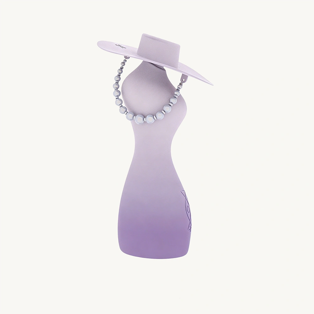 TAOF Protagonist pure lavender silicone device with white hat and embossed logo on a minimalist background.