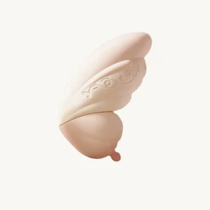 TAOF Liberty Blush butterfly-shaped massager in soft pink, shown against a clean white background with elegant embossed details.