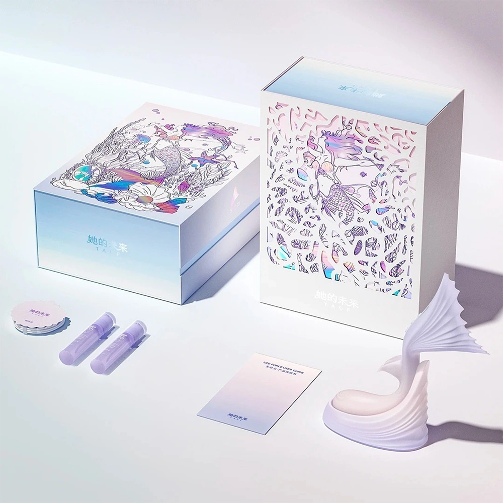 A complete flat lay of the TAOF Vivare Lavender Purple gift set, showcasing the intricately illustrated boxes, matching lilac accessories, and the sculpted pastel massager.