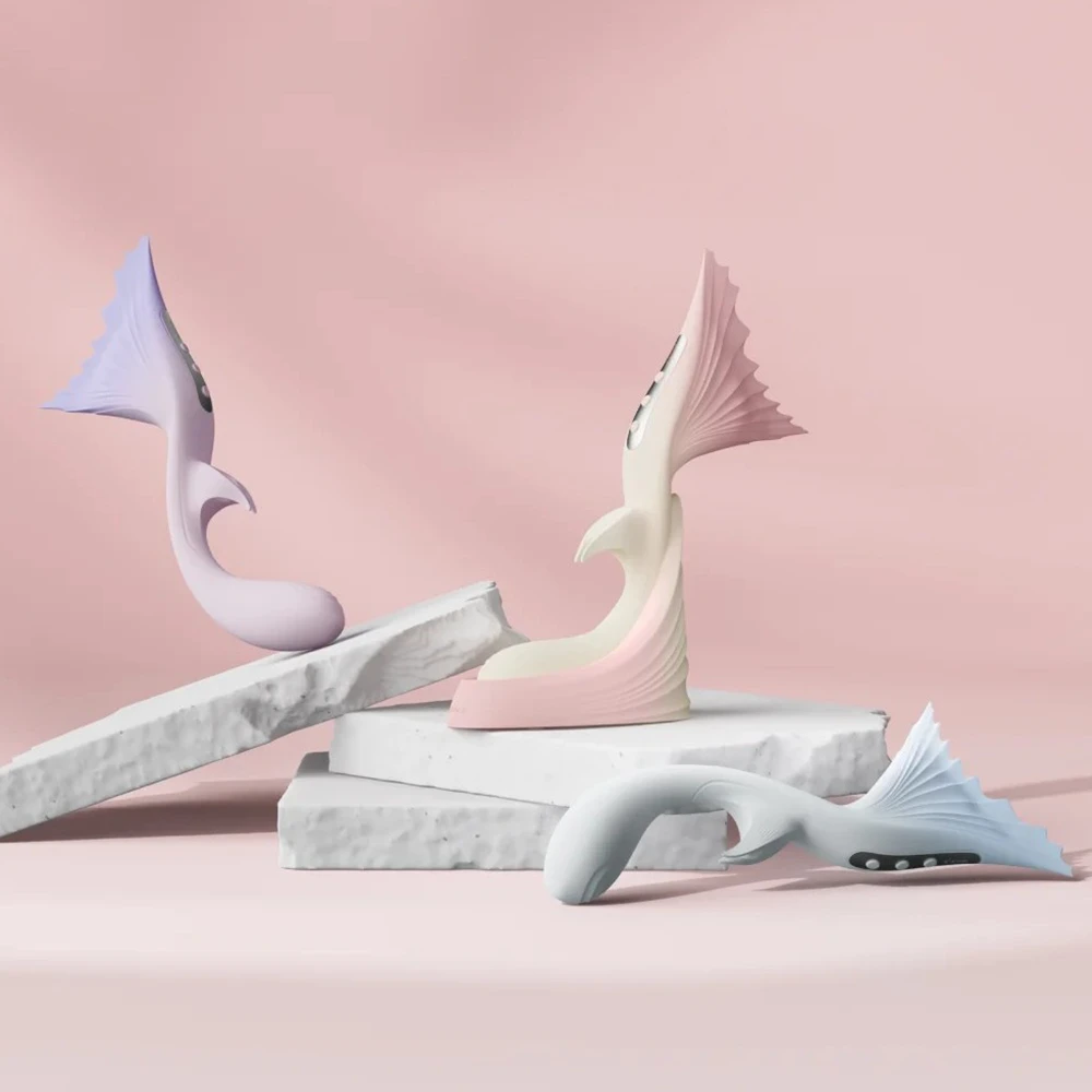 The TAOF Vivare collection arranged gracefully on angular white marble blocks against a soft pink backdrop, highlighting its sculptural curves and pastel shades.
